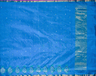 Ocean blue Uppada silk Jamdani saree with silver zari floral motifs circular rose border and magenta pink edge