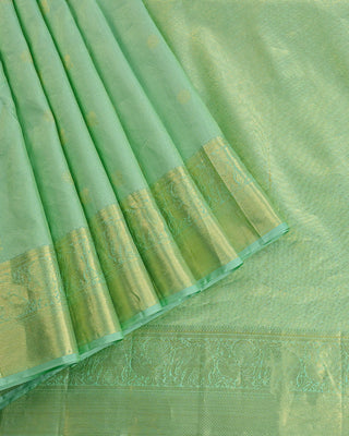 Mint green Kanjivaram tissue silk saree with Gandaberunda bird zari motifs
