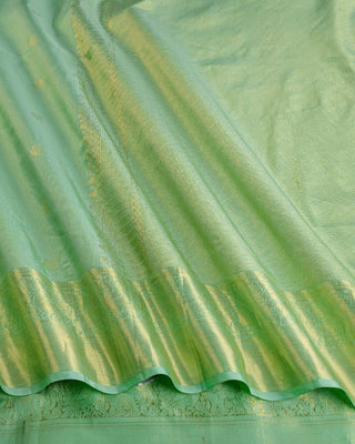 Mint green Kanjivaram tissue silk saree with Gandaberunda bird zari motifs