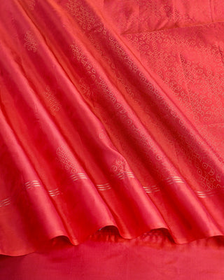 Vermilion red soft silk saree with gold zari rangoli motif weave and matching blouse