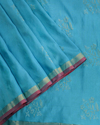 Light blue pure Uppada silk saree with dual-tone zari floral motifs