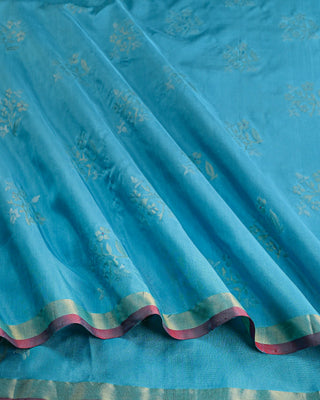 Light blue pure Uppada silk saree with dual-tone zari floral motifs