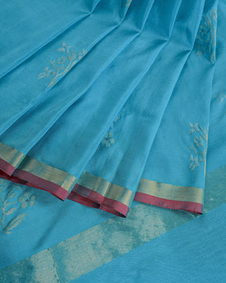Light blue pure Uppada silk saree with dual-tone zari floral motifs