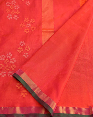 Dual tone orange and red pure silk Uppada Jamdani handloom saree with floral motifs and gold zari kaddi border