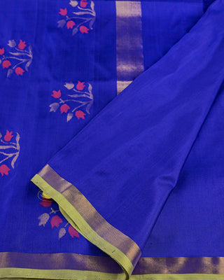 Royal ink blue pure silk Uppada Jamdani saree with contrast parrot green gold zari border and pink floral bouquet motifs