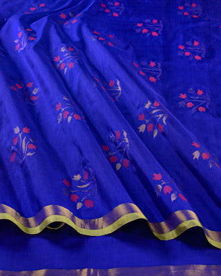 Royal ink blue pure silk Uppada Jamdani saree with contrast parrot green gold zari border and pink floral bouquet motifs