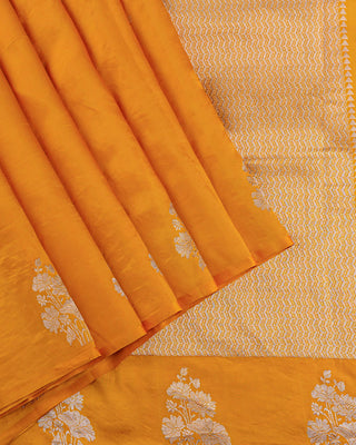 Mustard yellow Poona silk saree with silver zari floral motifs and striped blouse
