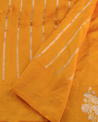 Mustard yellow Poona silk saree with silver zari floral motifs and striped blouse