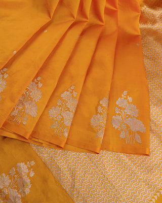 Mustard yellow Poona silk saree with silver zari floral motifs and striped blouse