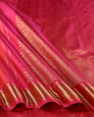 Pink orange dhoop chhaon pure silk handwoven Kanjivaram saree with gold zari coin buttas peacock pallu and temple border
