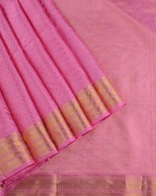 Baby pink soft silk saree with woven diamond pattern, gold zari border and matching blouse
