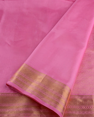 Baby pink soft silk saree with woven diamond pattern, gold zari border and matching blouse