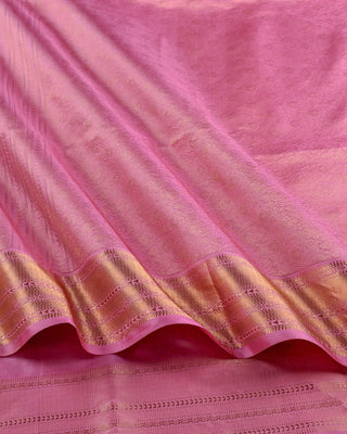 Baby pink soft silk saree with woven diamond pattern, gold zari border and matching blouse