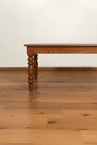 Vintage solid teakwood center table with turned legs and natural wood grain