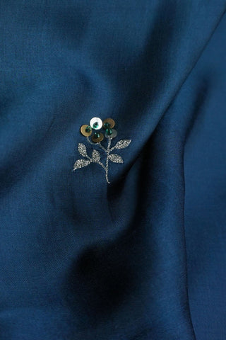 Teal to navy ombre modal silk saree with machine embroidered floral motifs and zari blouse