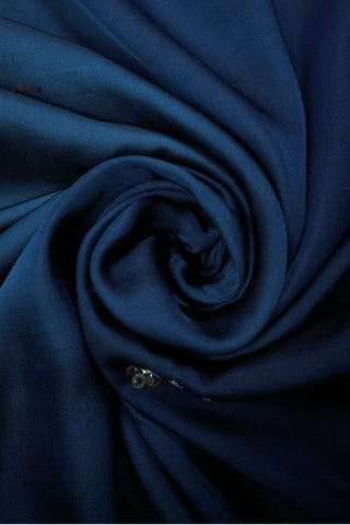 Teal to navy ombre modal silk saree with machine embroidered floral motifs and zari blouse