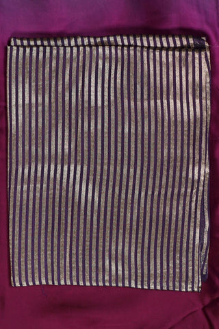 Emerald green to magenta purple ombre modal silk saree with zari striped facing and navy blouse