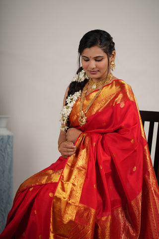 Kanjivaram Red Silk Saree with Rudraksh, Peacock, and Elephant Motifs