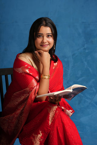 Bright Red Silk saree with Peacock Motifs