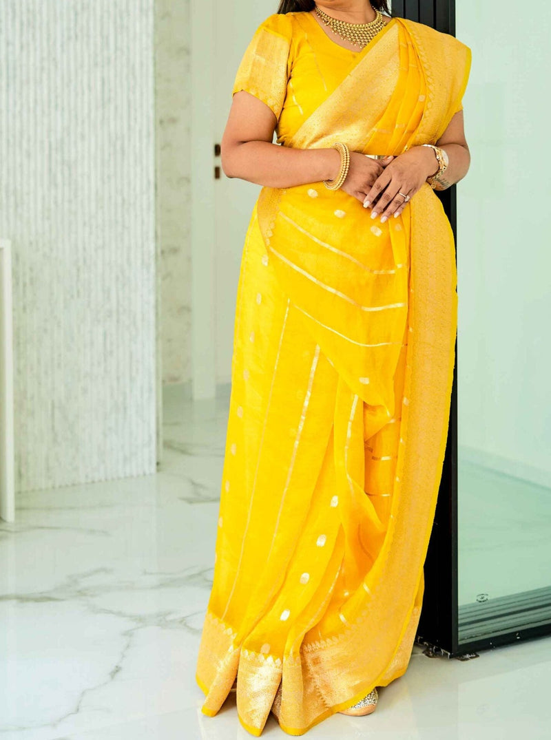 Dolly Jain's Yellow Handloom Banarasi Organza Saree