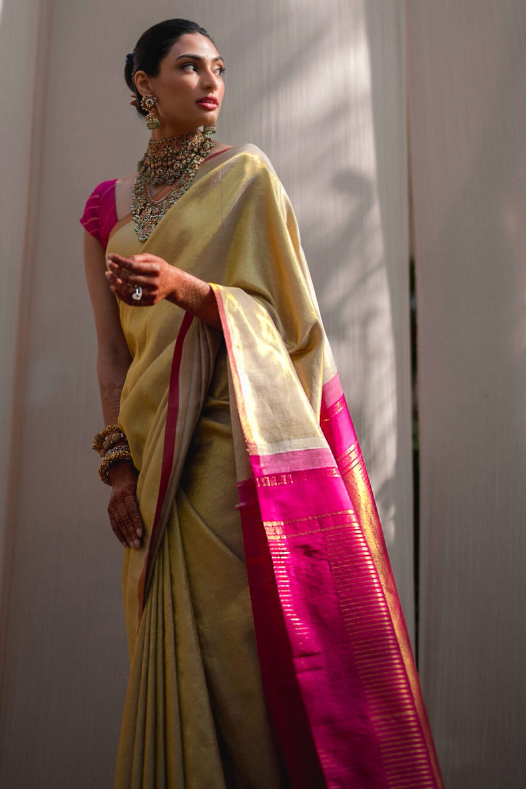 Uppada magenta pink handwoven pure silk saree with wide golden zari border