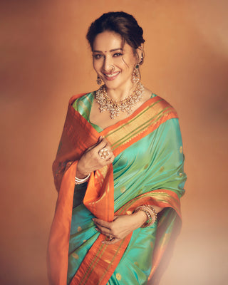 Madhuri Dixit’s Sea Green and Orange Handloom Paithani Silk Saree