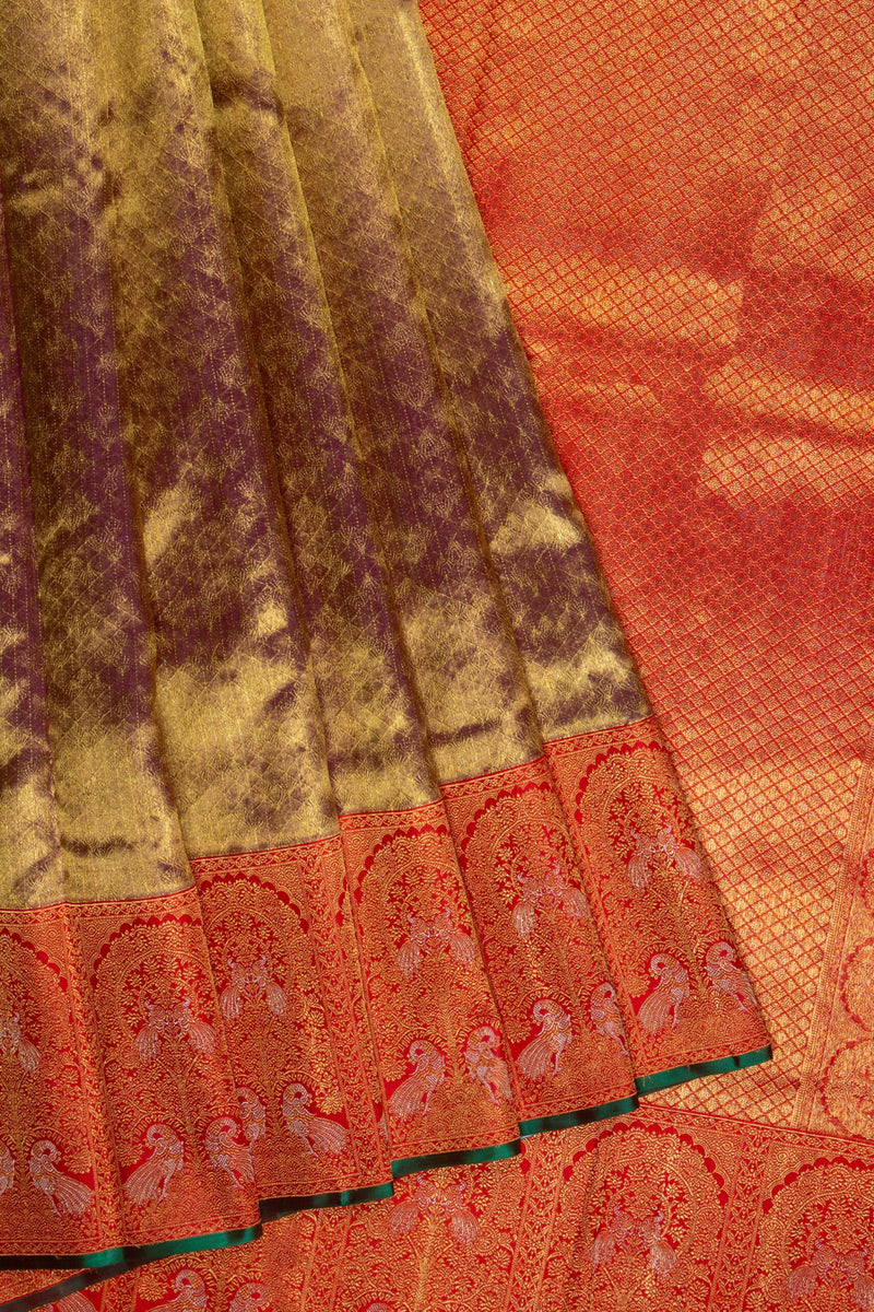 Royal Elegance: Gold Kanchipuram Tissue Saree with Red-Gold Peacock Border